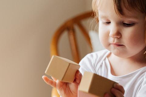 child playing with blocks