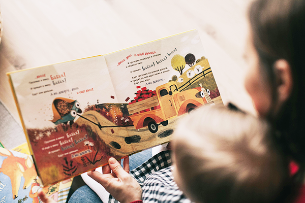 child being read to